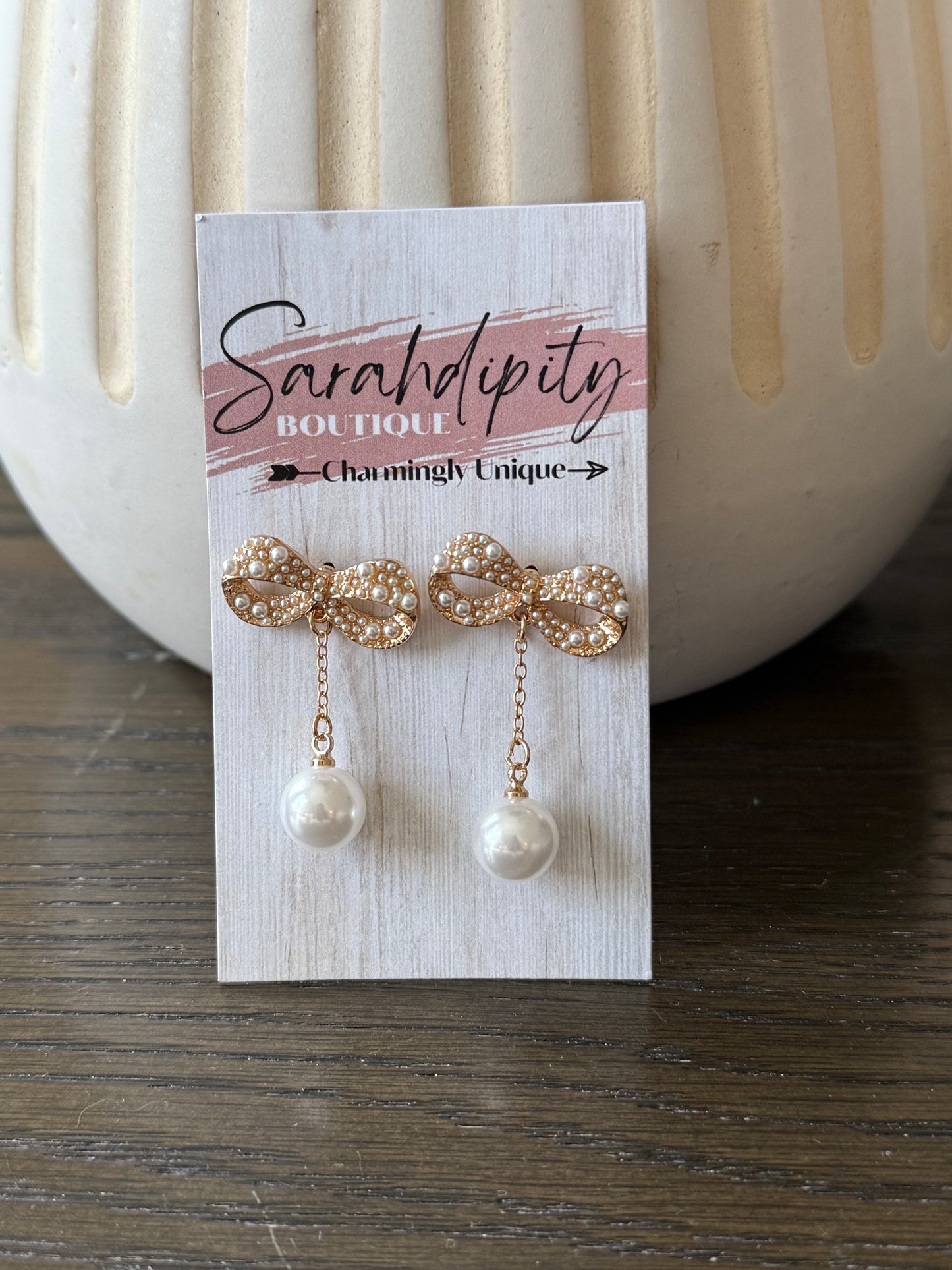 Gold Bow Earings with a Dangling Pearl