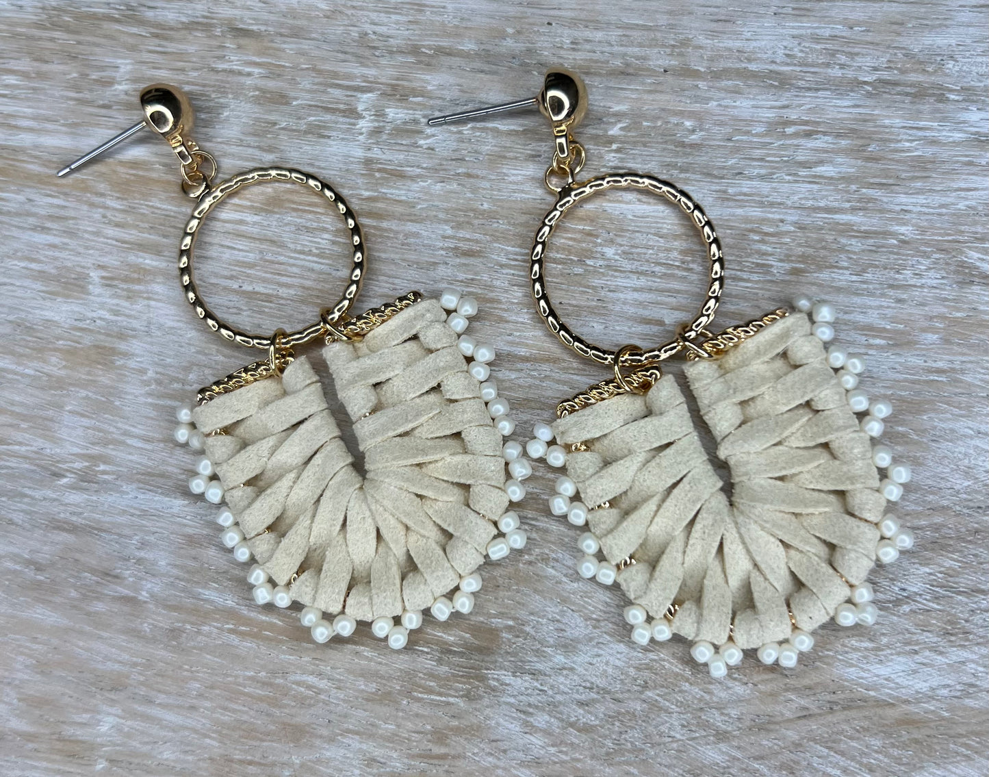 Off-white leather cord earrings