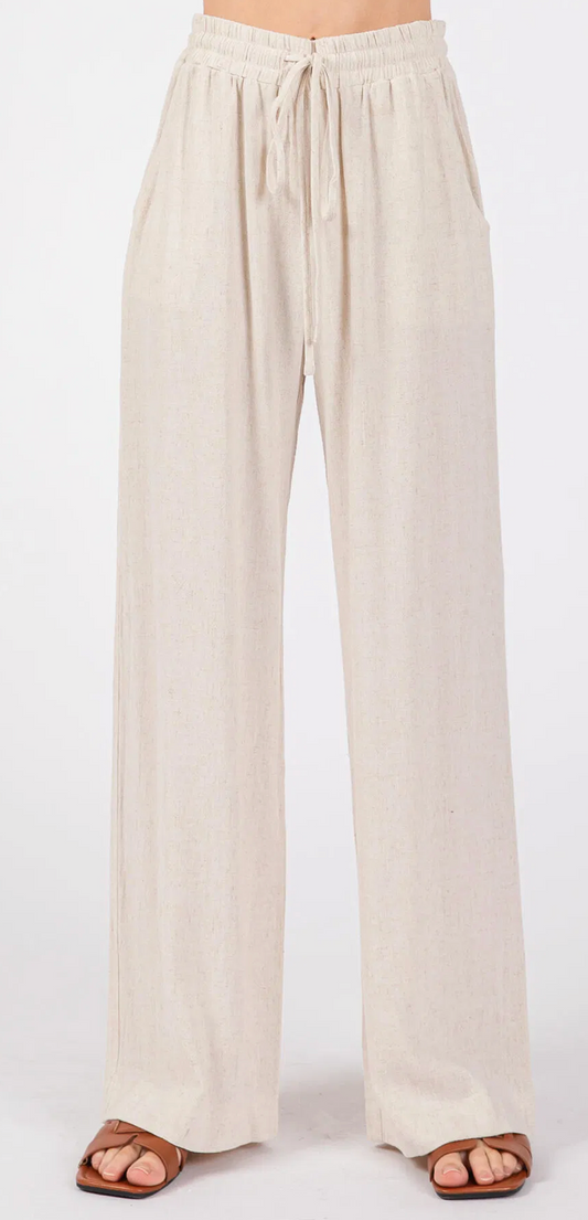 SPLIT HEM WIDE LEG PANTS.