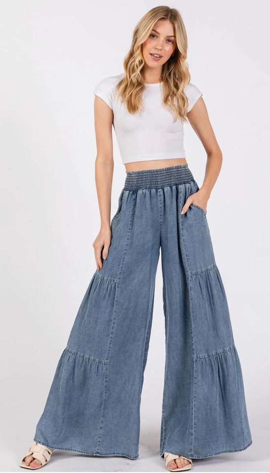 DENIM TENCEL SMOCKED WAIST SIDE TIERED DETAIL WIDE LEG PANTS.