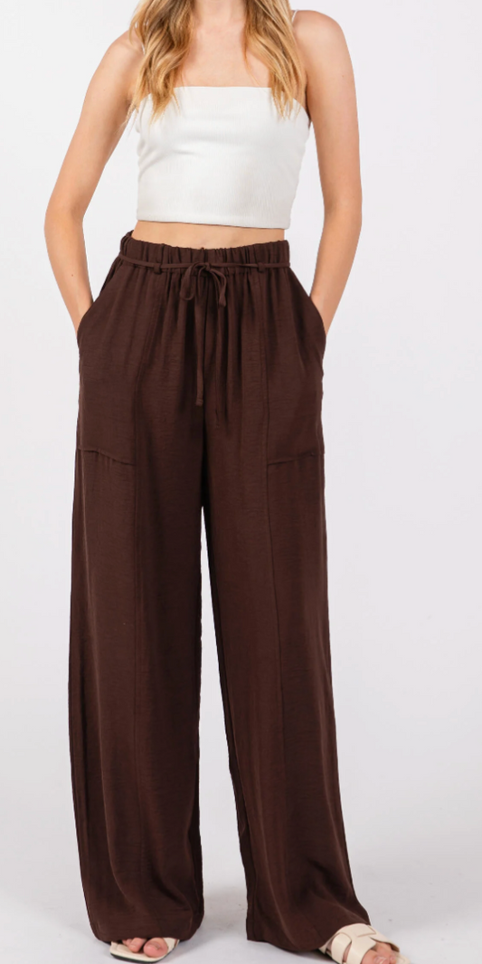 FRONT POCKET ELASTIC WAIST W/ STRAP BELT PULL ON STYLE PANTS.